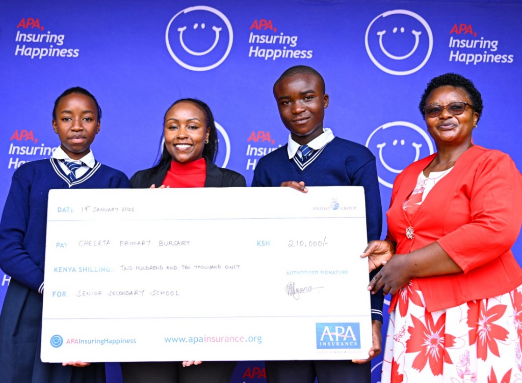 Students from Chelata Primary School receive scholarship cheques from APA Apollo Foundation