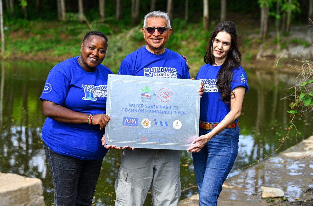 Regina Kamau, Ashok Shah, and Meera Pandit celebrate the completion of the Seven Sand Dams Initiative
